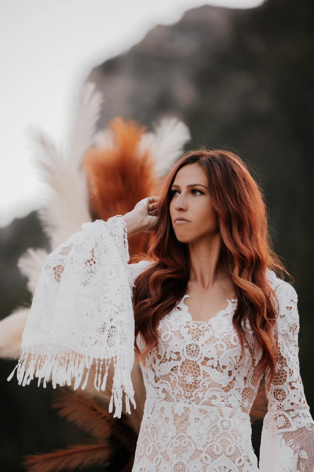 lace wedding dress and bride in her bridal photos