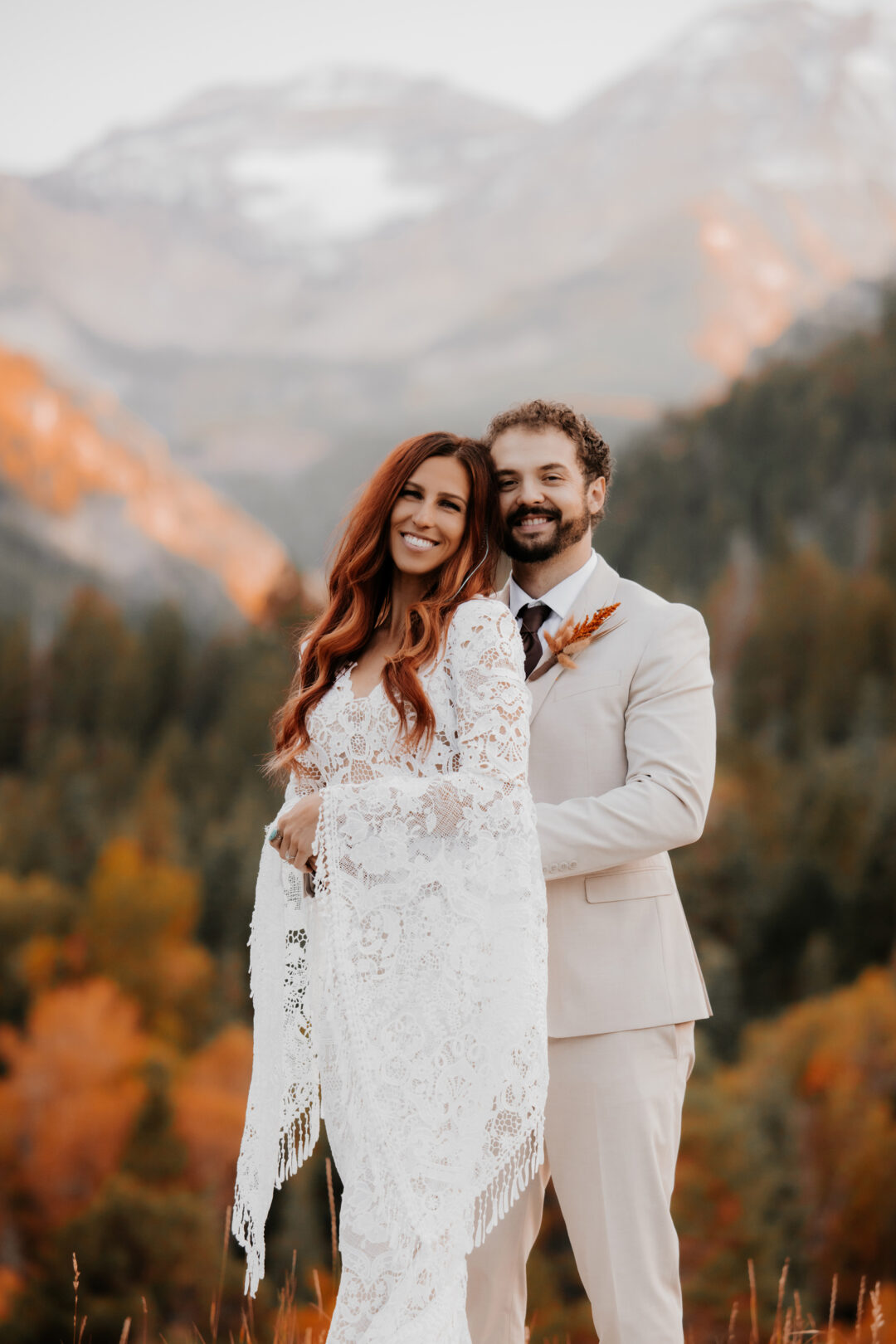 Smiling for elopement pictures at tibble fork reservoir wedding