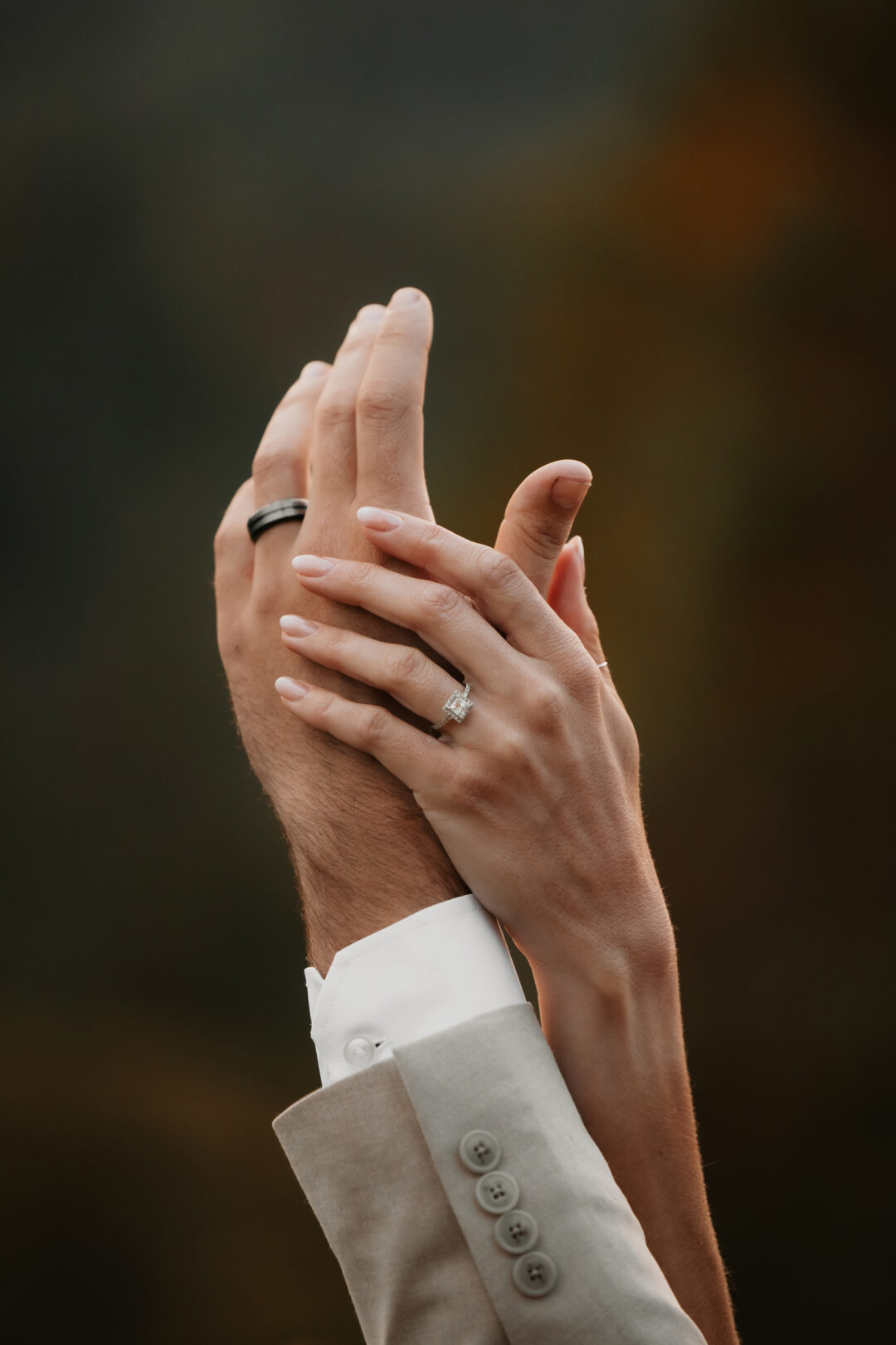 Wedding rings up in the air